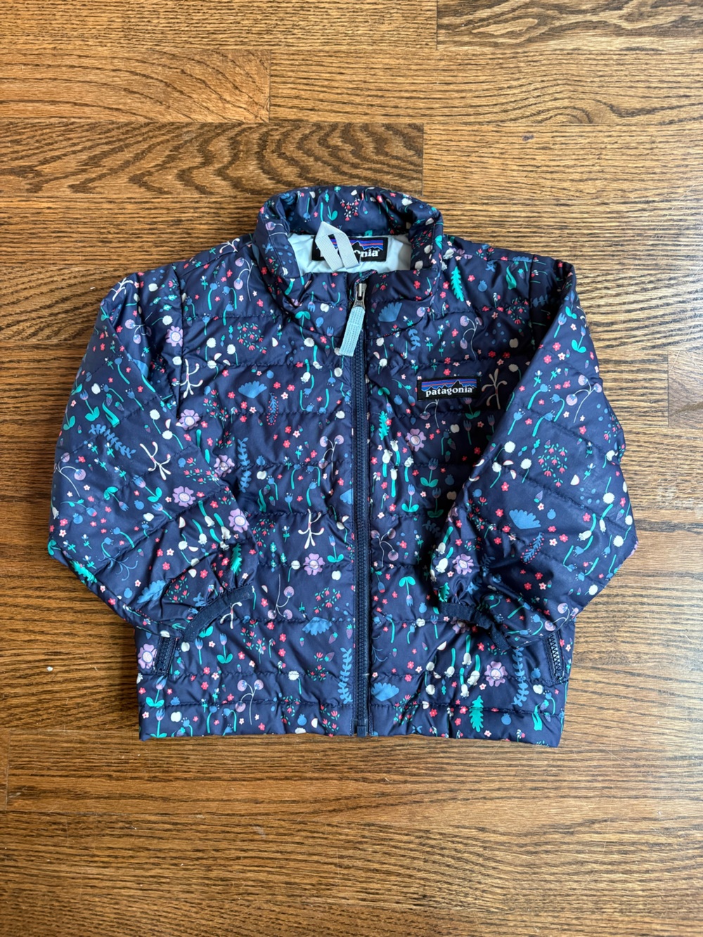 Patagonia Navy Floral Puffer Jacke with Teal & Pink Accents